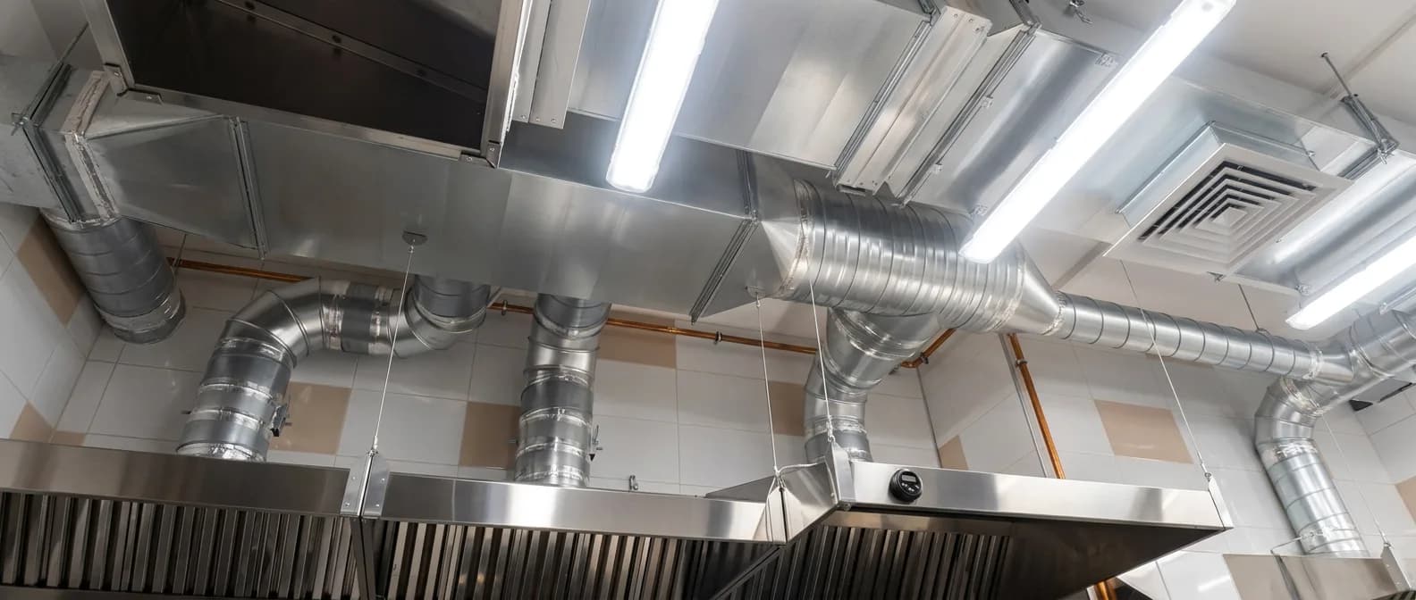 Commercial kitchen ventilation ductwork and exhaust hood system